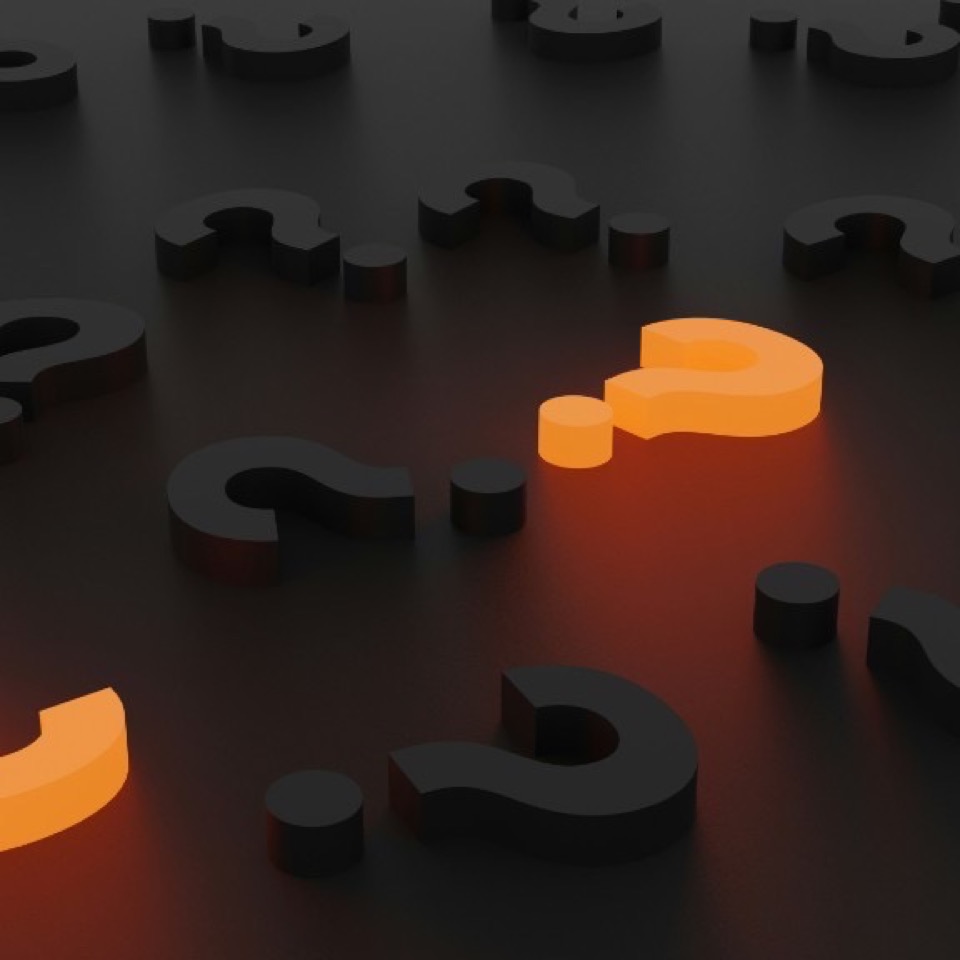 3D question marks on a dark surface with glowing orange highlights